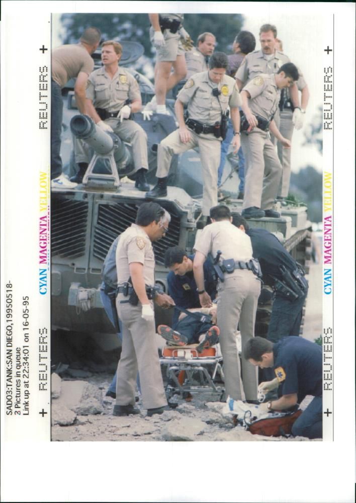 Police officers on a national guard tank. - Vintage Photograph