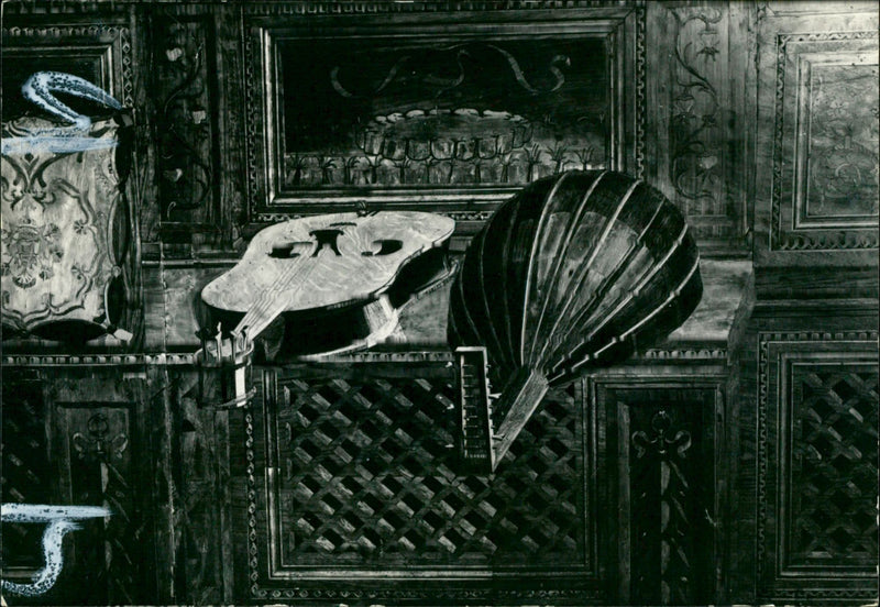 Musical instrument stands on a shell. - Vintage Photograph