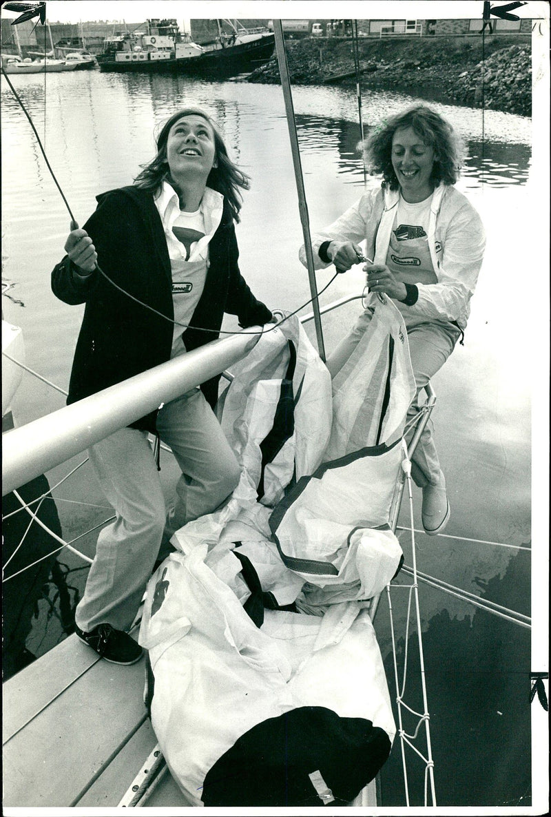 Pippa Longley and Katie Clemson hoist. - Vintage Photograph