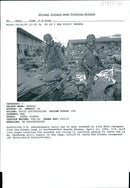 A uN soldier peacekeeper carry one of the many wooden. - Vintage Photograph