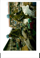 A uN soldier peacekeeper carry one of the many wooden. - Vintage Photograph