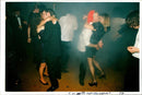 Throbbing music, lights and smoke machines as dancing. - Vintage Photograph