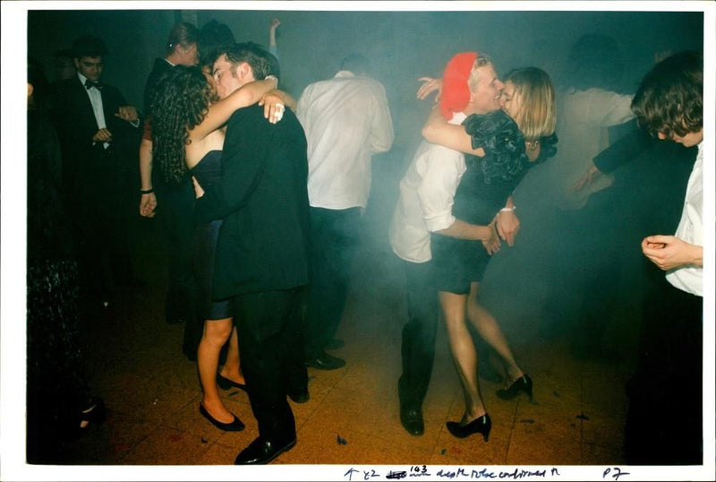 Throbbing music, lights and smoke machines as dancing. - Vintage Photograph