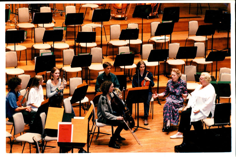 Elizabeth and Ursula with some Musicians. - Vintage Photograph