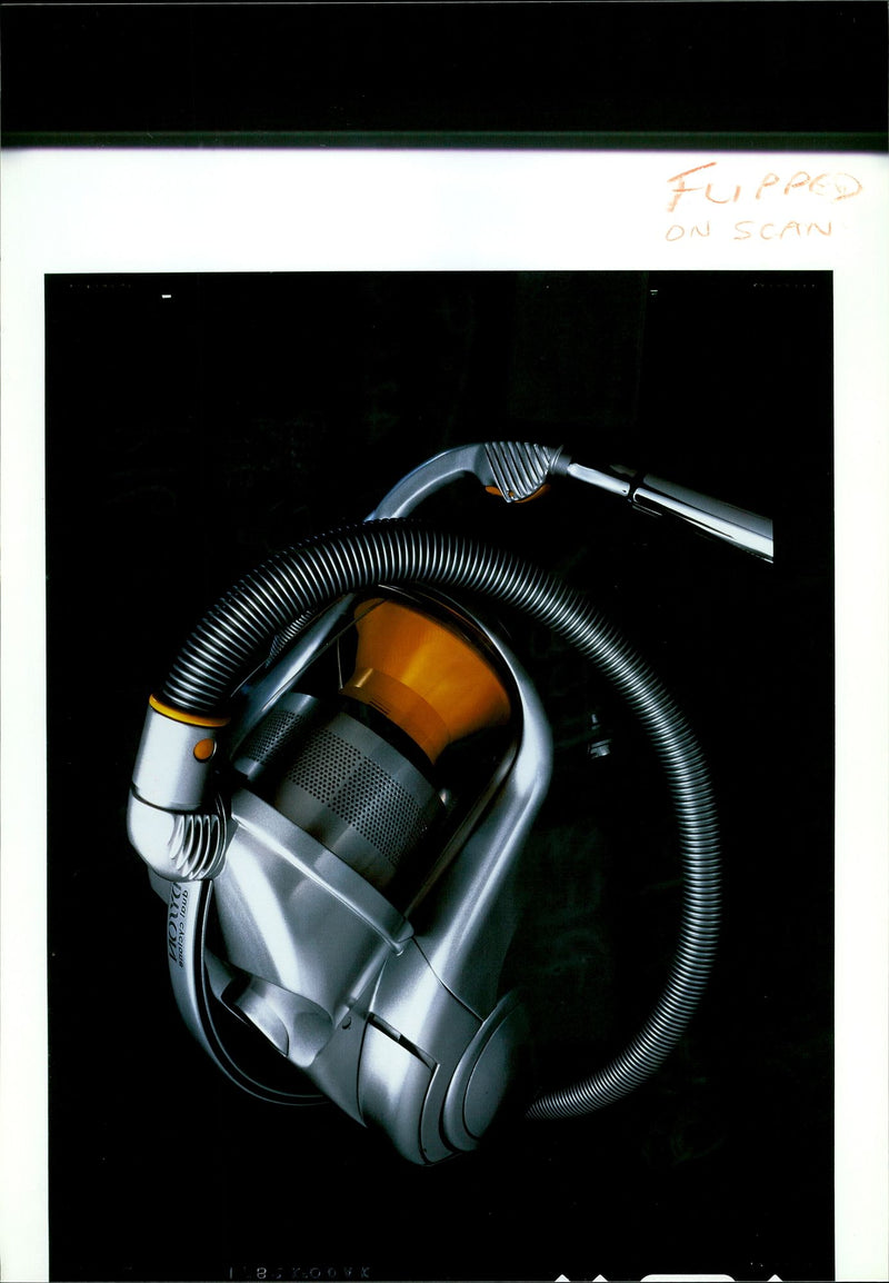 The revolutionary Dual Cyclone vacuum cleaner. - Vintage Photograph