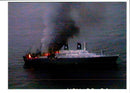 Fires continue to burn inside the Italian Ship Achille Lauro. - Vintage Photograph