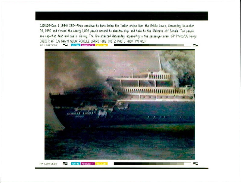 Fires continue to burn inside the Italian Cruiser. - Vintage Photograph