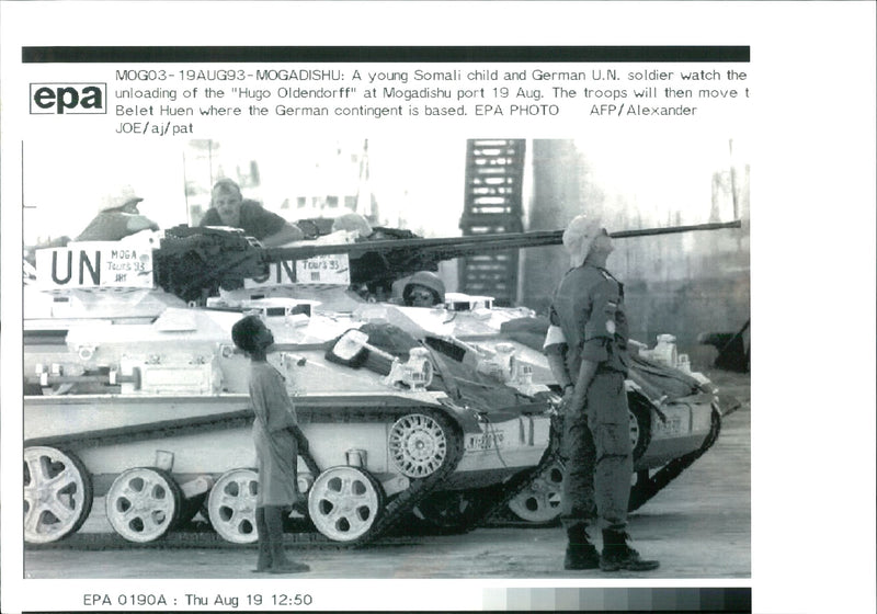 A young somali child and german UN soldier. - Vintage Photograph