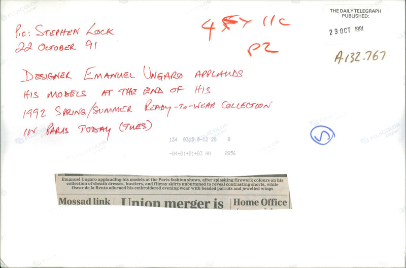 Emanuel Ungaro applauds his models. - Vintage Photograph