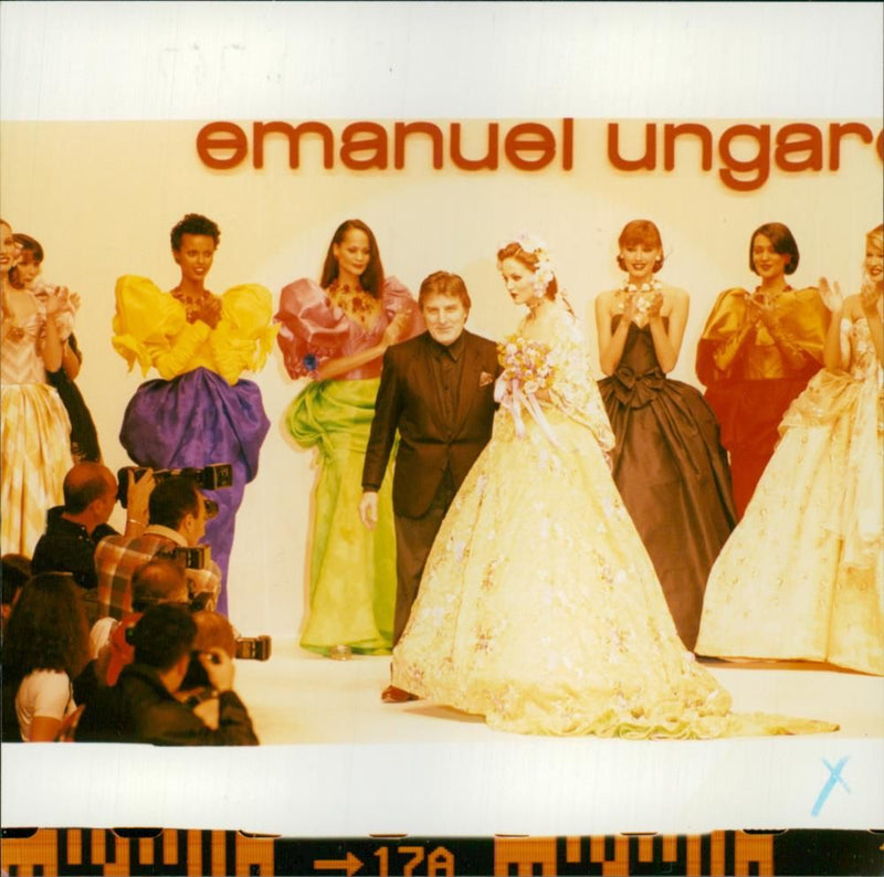 Emanuel Ungaro with some models. - Vintage Photograph