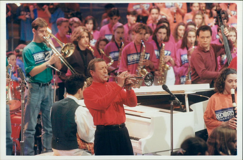 Roy Castle, former English entertainer performing with a group of musician - Vintage Photograph