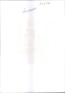 A volunteer holds up a victim of the oil tanker. - Vintage Photograph