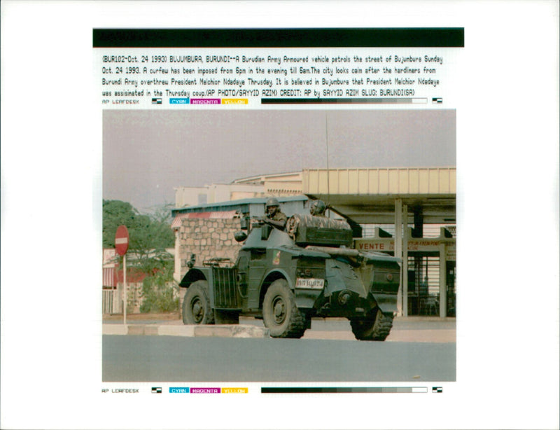 A burundian army armoured vehicle patrols the street of bujumburs. - Vintage Photograph