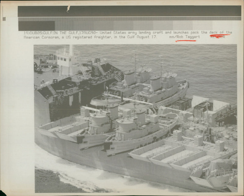 United States army landing craft and launches pack the deck. - Vintage Photograph