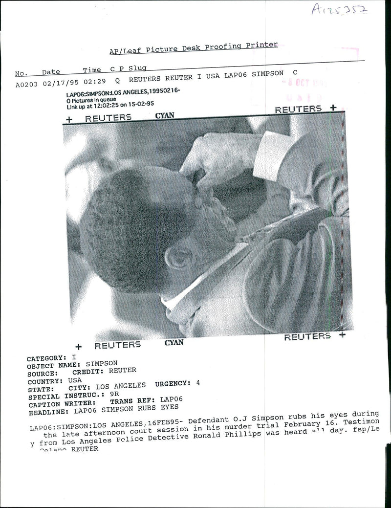 Defendant O.J Simpson rubs his eyes during the late afternoon court session in his murder trial. - Vintage Photograph