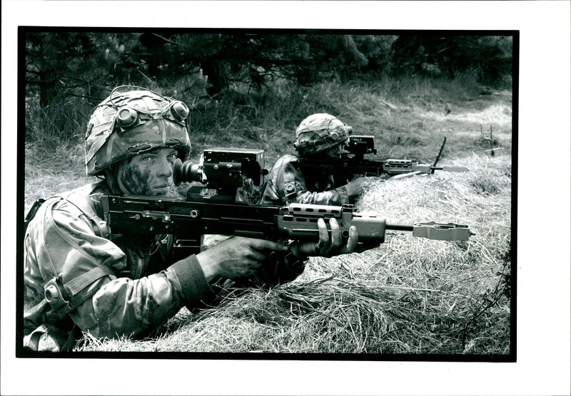 A soldier hold a SA-80 Riple Guns. - Vintage Photograph