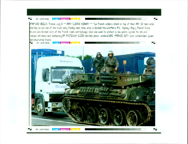 Two french soldiers stand on top of their AMX 30 tank. - Vintage Photograph