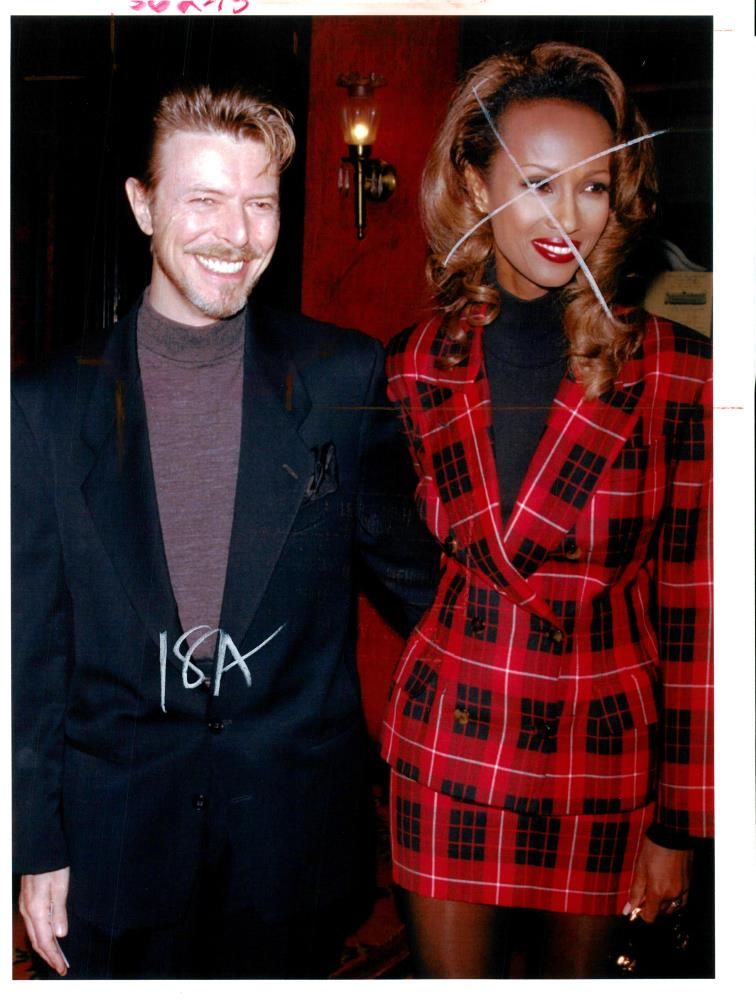 David Bowie with his wife Iman. - Vintage Photograph