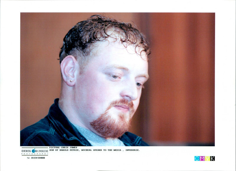Son of murdered Harold Petrie, Micheal speaks to the media - Vintage Photograph