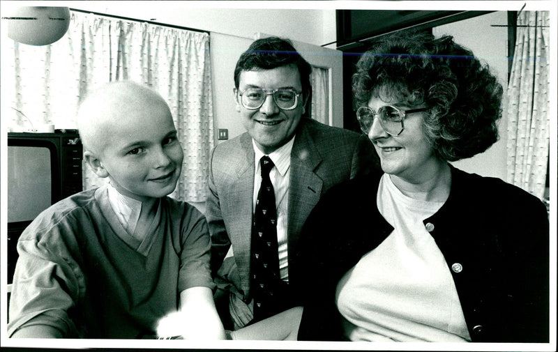 Living in Hope: Gareth Owen with his mother Sylvia and Dr. Stevens. He has a better than 50 percent chance of a cure - last year it would have been 30 percent. - Vintage Photograph