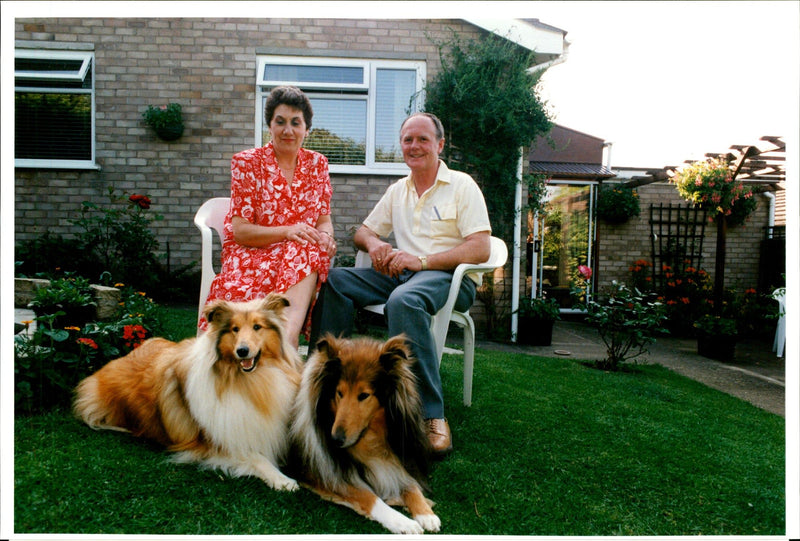 Peter and Cathryn Watson with their dogs Gemma and Laddie. - Vintage Photograph