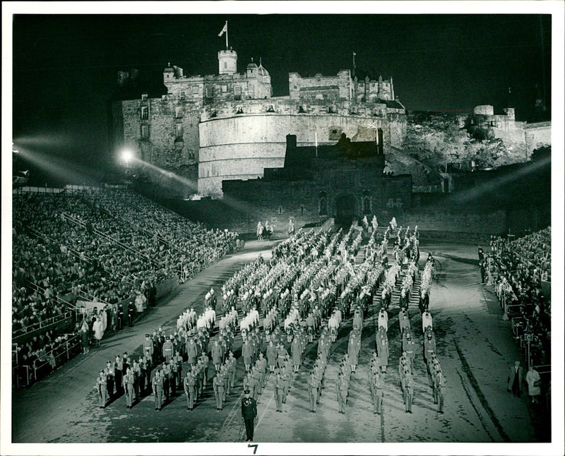 A full muster of those taking part in the military tattoo. - Vintage Photograph