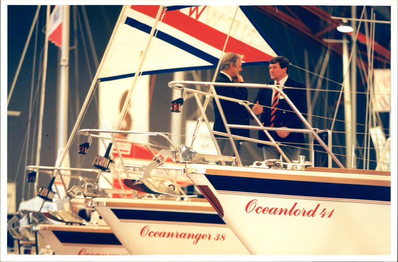 A photograph of two man in a Boat Show. - Vintage Photograph