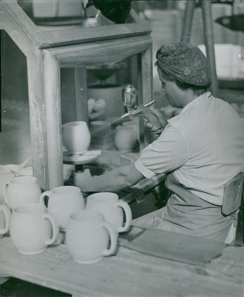 RÃ¶rstrand beach porcelain factory. A set of mugs spray-painted - Vintage Photograph