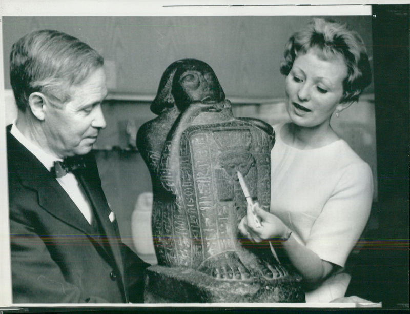 LinkÃ¶ping Museum. Bengt Cnattingus, the chief of the museum of country music and the amanuens Gun BjÃ¶rkman, demonstrates Egyptian stone sculpture - Vintage Photograph