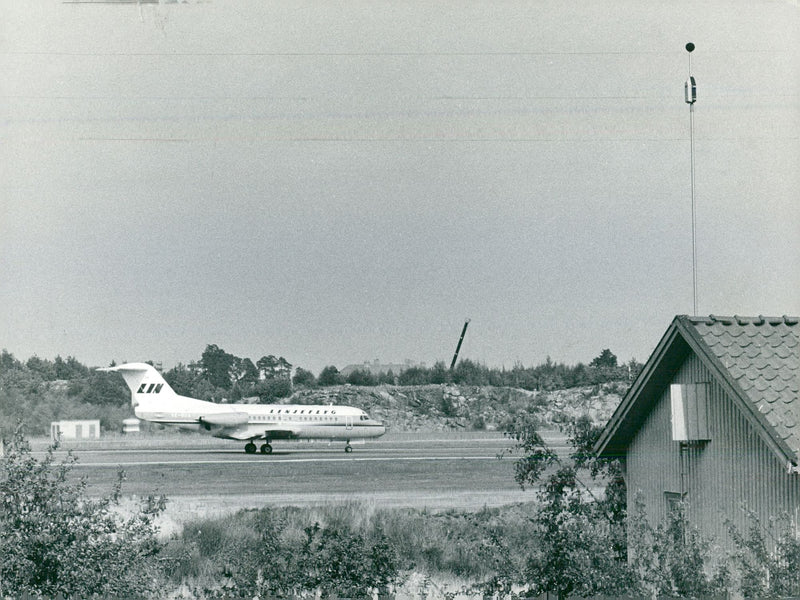 Automatic noise meter on a villa at LillÃ¤ngsgatan next to the Bromma field. On the track, the disputed Fokker plane - Vintage Photograph
