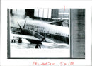 Industrial blowers were used to clear snow and ice from plane - Vintage Photograph