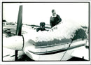 Pilots clearing snow from the planes at Elstree Aerodrome - Vintage Photograph
