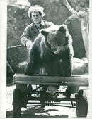 Bear Katja moped with carer Alvar Samuelsson - Vintage Photograph
