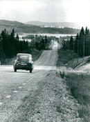 Blue road. Most of the 50 km long road is asphalted - Vintage Photograph