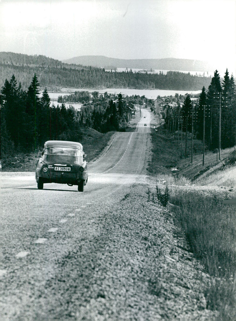 Blue road. Most of the 50 km long road is asphalted - Vintage Photograph