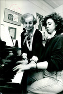 1987 PROF GRINDEA WITH PUPIL RACHEL LASSERSON OVERCOMING STAGE PUBLISHED CONCERT - Vintage Photograph