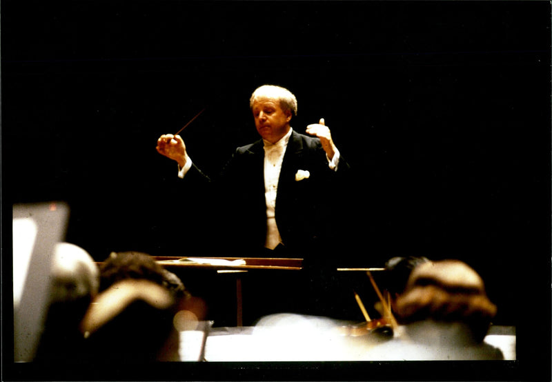 Leonard Slatkin pictured conducting an orchestra - Vintage Photograph