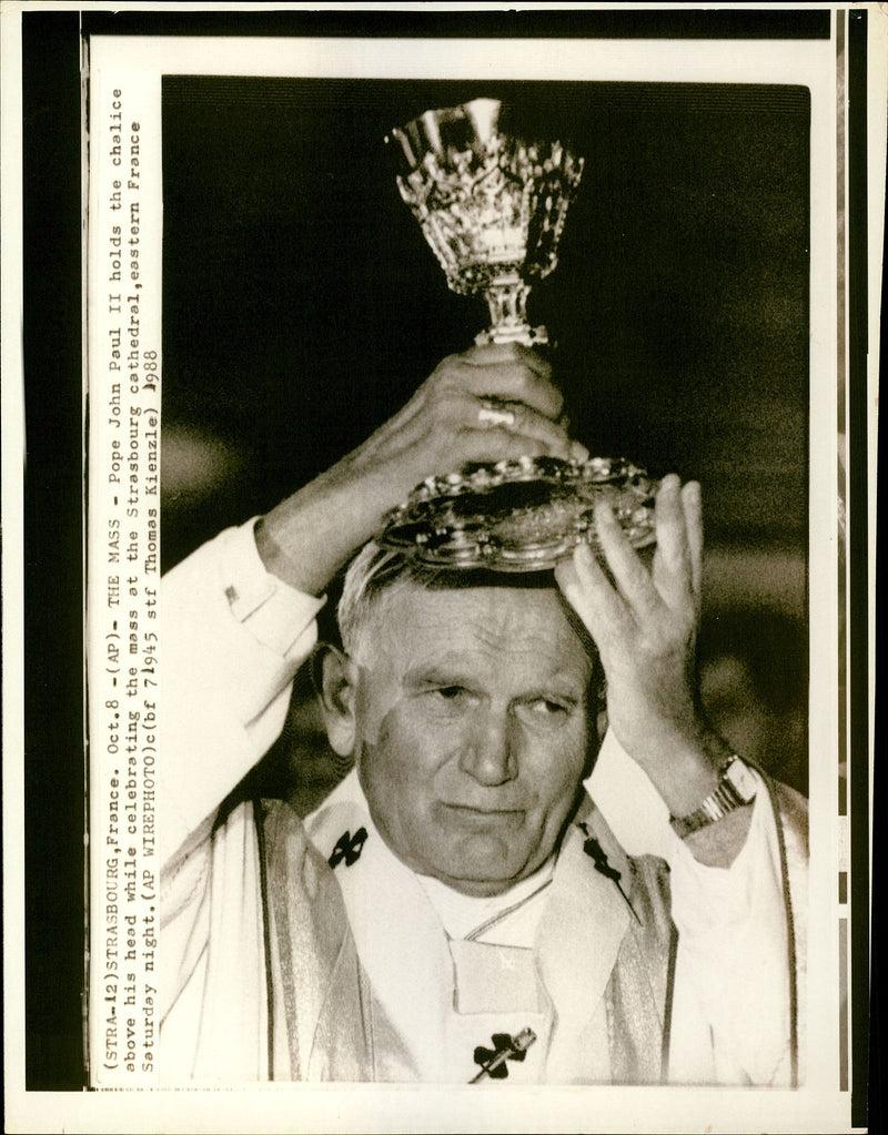 Pope John Paul II holds the chalice above his head - Vintage Photograph