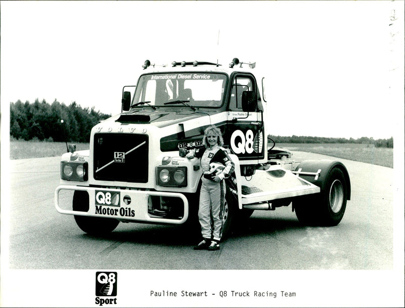 Pauline Stewart leaning on a Volvo truck - Vintage Photograph