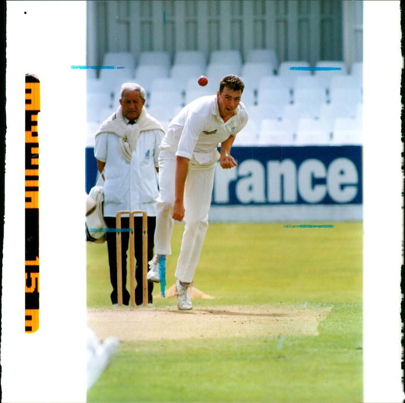 English cricketer Angus Fraser in bowling action - Vintage Photograph