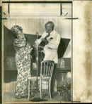 President Kenneth Kaunda and Mrs. Kaunda providing some impromptu entertainment - Vintage Photograph