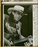 BLUES GUITARIST STEVIE VAUGHAN AND FOUR OTHER MUSICIANS WERE CONCERT - Vintage Photograph