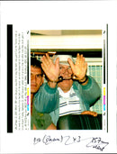 Handcuffed war criminal John Demjanjuk on the way to prison - Vintage Photograph