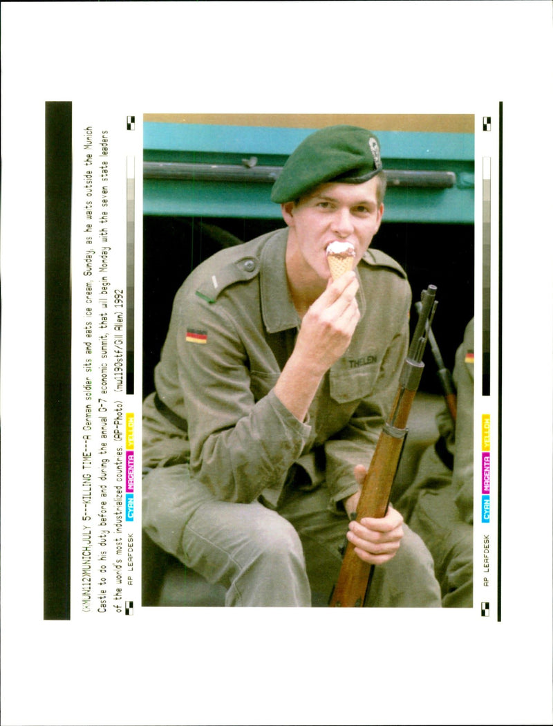 German soldier sits and eats ice cream - Vintage Photograph