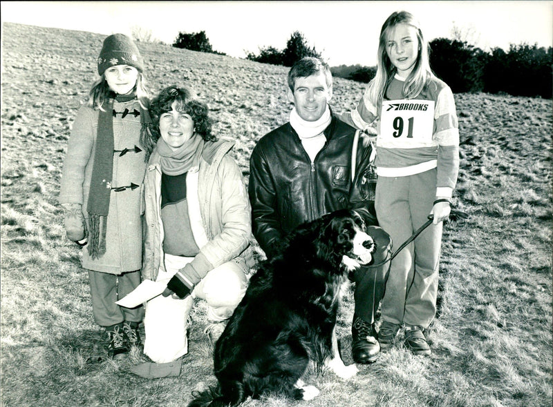 Squadron-Leader Nigel Wood pictured at his home with his wife Irene, daughters Kathryn and Melanie and dog Cholla - Vintage Photograph