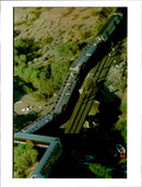 1995 AMTRAK SUNSET LIMITED TRAIN LIES ITS SIDE TITLE USA WRITER COUNTRY - Vintage Photograph