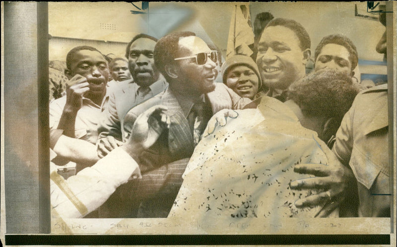 Edgar Tekere is hugged by an admirer after being acquitted of murdering a white farmer - Vintage Photograph