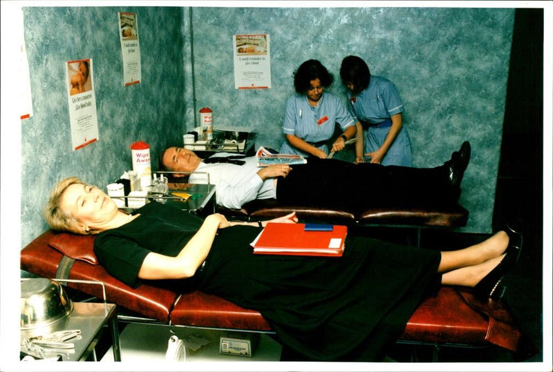Health Minister Virginia Bottomley and her husband donating blood - Vintage Photograph
