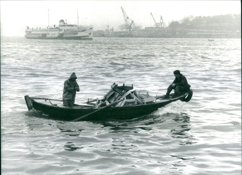 Fisherman on boat - Vintage Photograph