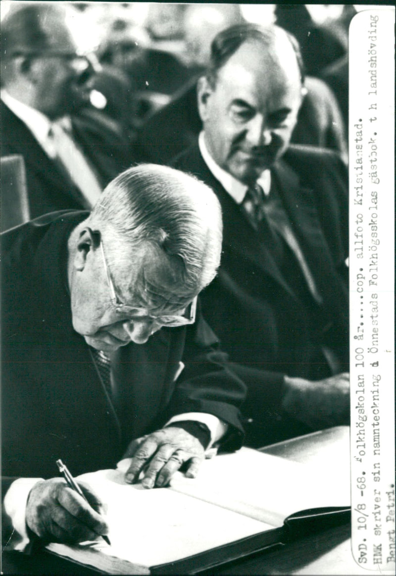Gustaf VI Adolf writes his signature in the guestbook - Vintage Photograph